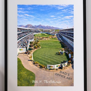 May include: Framed print of a golf course, Hole 16, The Coliseum, with a green fairway, spectators, and a blue sky. The text "DAD'S OFFICE ART" and "Hole 16, The Coliseum" are visible.