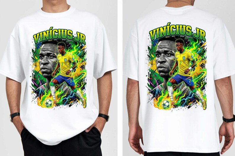 Puede incluir: Camiseta blanca con un gr&aacute;fico vibrante del futbolista Vin&iacute;cius J&uacute;nior. El dise&ntilde;o incluye un retrato y una pose de acci&oacute;n, con el nombre "Vin&iacute;cius Jr" en verde. La camiseta tiene cuello redondo y mangas cortas.