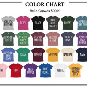 May include: Color chart of Bella Canvas 3001Y t-shirts in various colors, including Athletic Heather, Berry, Black, Dark Grey Heather, Forest, and Heather Deep Teal. Each shirt displays its color name in a bold, white font.