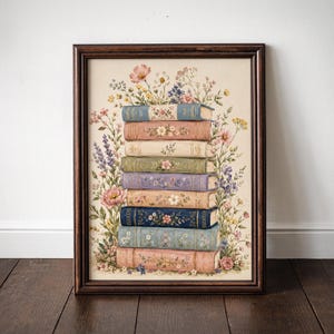 May include: A framed print featuring a stack of vintage books adorned with floral designs. The books are in various pastel colors, surrounded by a vibrant array of flowers in pink, purple, and yellow. The frame is a dark brown color.