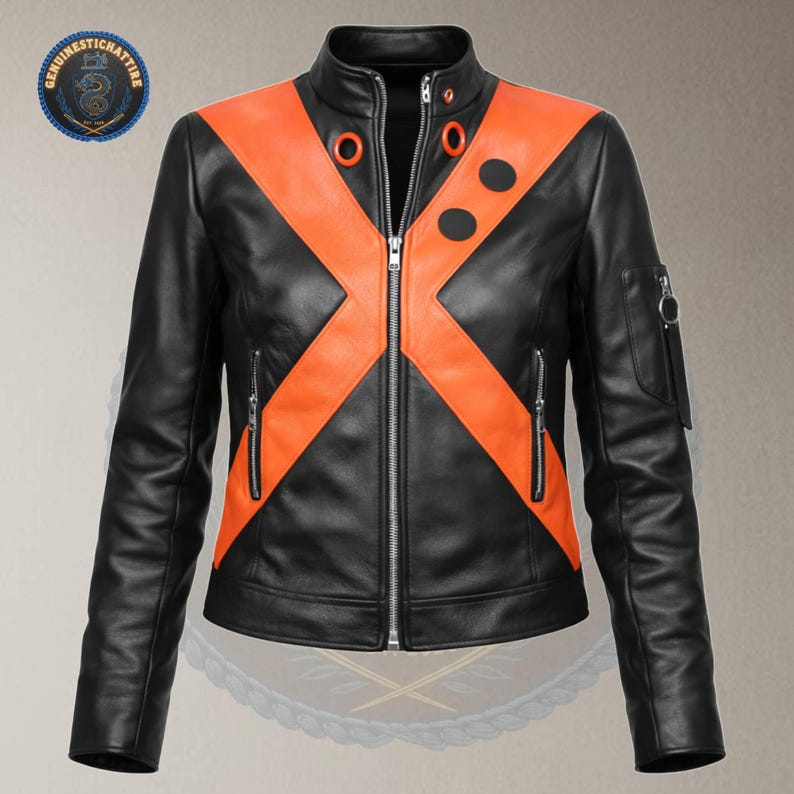 Front view of the black and orange Bakugo My Hero Academia real leather cosplay jacket on a mannequin, showcasing the large stitched orange chest "X", high collar with orange accent eyelets, and asymmetric chest button details.