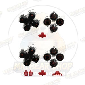 May include: A set of black gaming controller buttons featuring red directional arrows and red geometric symbols including a triangle, square, circle, and cross. The set includes additional small red plastic components and connectors for assembly.