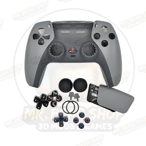 May include: A white ceramic mug with a black handle and the text "But First, Coffee" in a bold, black font. The mug is set against a blurred background, suggesting a cozy setting.