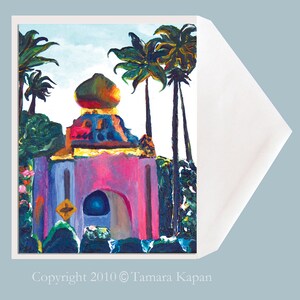 May include: A painting of a pink building with a golden dome, surrounded by palm trees. The building has a blue archway and a yellow sign with a black arrow. The painting is done in a colorful, impressionistic style.