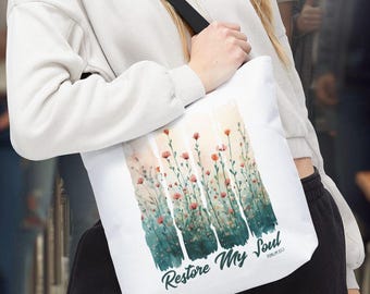 Bolsa cristã com estampa floral em aquarela "Restaure Minha Alma", ideal para líderes de louvor e acessórios de fé.