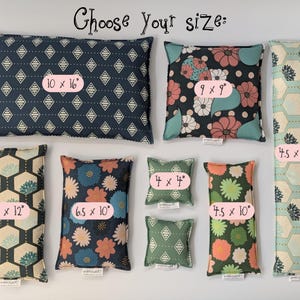 May include: A collection of rectangular and square fabric pillows in various sizes labeled Choose Your Size. Sizes include 10x16, 9x9, 4.5x20, 6x12, 6.5x10, 4x4, and 4.5x10 inches. Patterns feature geometric diamonds, hexagons, and floral prints in navy, green, and pink.