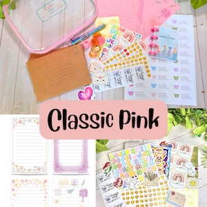 May include: A stationery set featuring a clear pink-trimmed pouch, brown envelopes, lined pink paper, a multi-color pen, a small address book, and various sticker sheets with emojis, rainbows, and letters. The text Little Letter Box is visible.