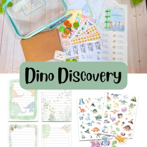 May include: A stationery set featuring a clear zippered pouch labeled Little Letter Box, brown envelopes, lined paper with dinosaur illustrations, a small address book, sticker sheets with dinosaurs and emojis, and loose dinosaur-themed stickers.
