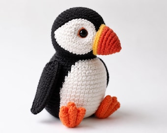 Create your own adorable crochet puffin with this detailed Amigurumi Puffin Crochet Pattern PDF!