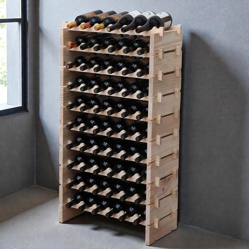 May include: A tall, light-colored wooden wine rack filled with numerous wine bottles. The rack is constructed from interlocking wooden pieces, creating multiple horizontal shelves. The bottles are arranged in rows, showcasing a variety of wine types.