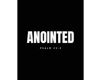 Puede incluir: Un arte de pared rectangular negro que presenta la palabra ANOINTED en letras mayúsculas blancas, grandes y en negrita, centradas en la parte superior. Debajo del texto principal, el texto blanco más pequeño dice PSALM 23:5 sobre el fondo negro.
