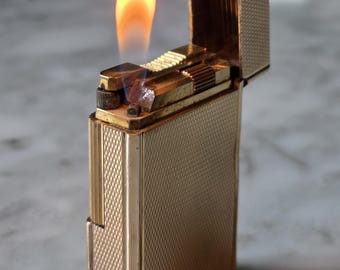 Accendino S.T. Dupont Ligne 1 GM Gold Grain d’Orge Ref. 14201, classico francese di lusso vintage.