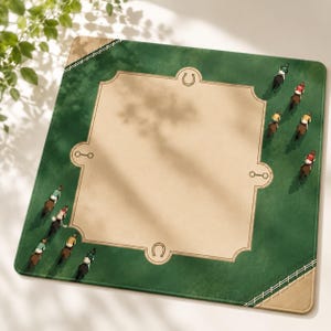 May include: A rectangular green mat featuring a central beige panel with a decorative border. The green border displays illustrations of jockeys on horseback in various colors. The corners have tan accents with white fence-like line patterns.