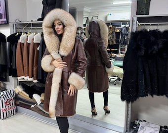 Long Leather Fur Hooded Coat – Luxury Winter Statement Outerwear for Women