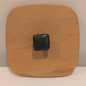 May include: A set of three ceramic mugs with a speckled, matte finish. The mugs are in shades of cream, light gray, and dark gray. Each mug has a simple, modern design and a rounded handle. Perfect for coffee or tea.