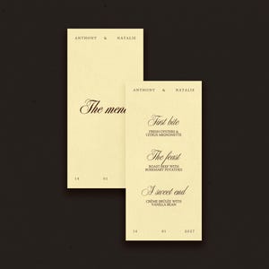 May include: Two rectangular cream-colored paper menus with dark brown text. The top reads ANTHONY & NATALIE. The right menu lists First bite, The feast, and A sweet end with food descriptions. The bottom corners display the date 14 01 2027.