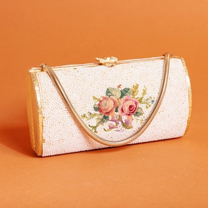 Cartera de mano estilo años 50 con diseño de tapiz floral y cuentas blancas y doradas, estilo vintage, con cierre tipo caja y asa, estilo formal