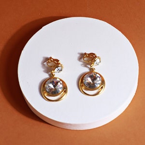 Vintage anni &#39;80 oro strass goccia penzolare clip sugli orecchini