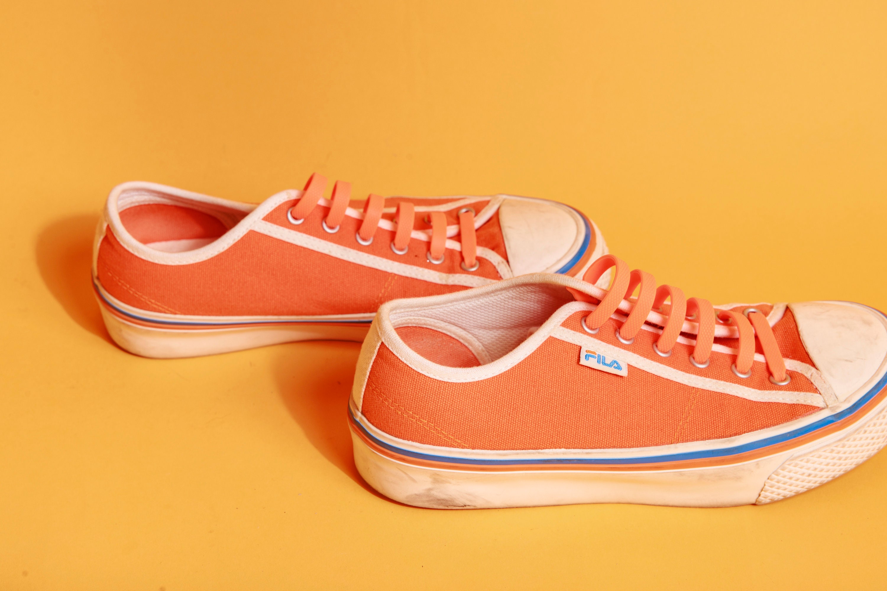 Orange and white filas hotsell