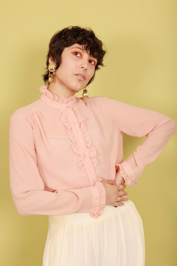 pink ruffle neck blouse