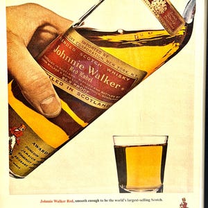 May include: Vintage advertisement for Johnnie Walker Red Label Scotch Whisky. The image shows a bottle being poured into a glass, with the brand's logo and text. The text reads "Johnnie Walker Red, smooth enough to be the world's largest-selling Scotch."