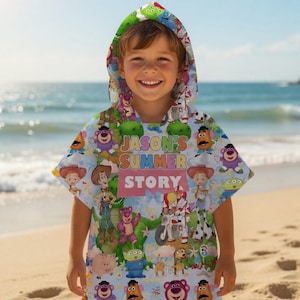 May include: A light blue hooded beach towel featuring characters from the Toy Story movie. The towel has the text "JASON'S SUMMER STORY" in pink and yellow. The hood is green with an alien print.