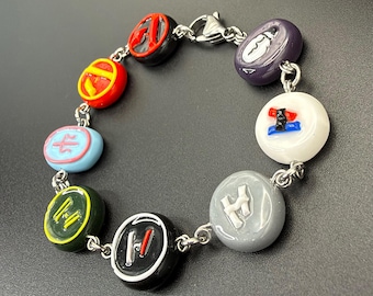 Handmade Polymer Clay Transformer Bracelet/Necklace/Accessory Inspired By Twenty One Pilots’ Logos