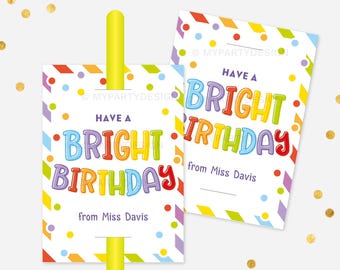 May include: Two colorful birthday cards with the text "Have a Bright Birthday" and a space to write "from Miss Davis". The cards have a white background with colorful stripes and confetti.