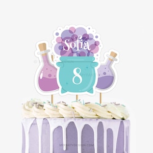 May include: Purple and blue cake topper with a cauldron, two potion bottles, and the name Sofia and the number 8.