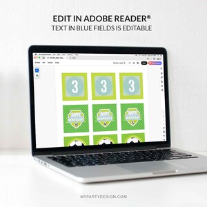 May include: A laptop displays a soccer-themed birthday party template. The design features green and blue squares with the number 3, soccer balls, and the text "HAPPY BIRTHDAY." The text "EDIT IN ADOBE READER&reg; TEXT IN BLUE FIELDS IS EDITABLE" is at the top.