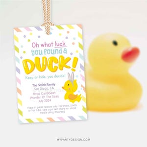 May include: A yellow rubber duck with a pink bunny ear headband. The duck is on a white tag with colourful stripes and polka dots. The tag says "Oh what luck you found a DUCK! Keep or hide, you decide!" The Smith Family, San Diego, CA, Royal Caribbean, Wonder Of The Seas, July 2024. Place in public spaces only. No shops, pools or hot tubs. Take a pic and share on social media using #hashtag. MYPARTYDESIGN.COM