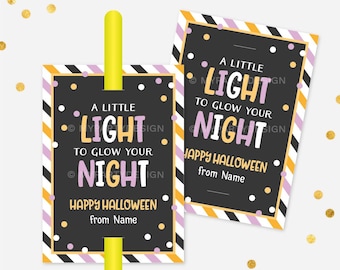 May include: Halloween-themed gift tags with the text "A Little Light to Glow Your Night" in white and purple on a black background. The tags have a striped border in orange, white, and purple, with gold polka dots.