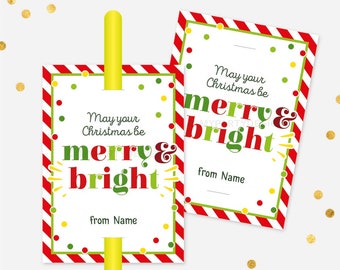 May include: Two rectangular Christmas gift tags with a red and white striped border and green and yellow polka dots. The tags read "May your Christmas be merry & bright" with space for a name.