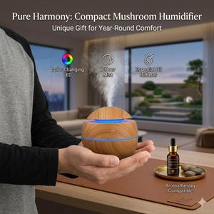 May include: A compact mushroom-shaped humidifier with color-changing LED and 8-hour mist. The humidifier is made of wood and has a blue light ring. The image also shows an essential oil diffuser and aromatherapy-compatible products.