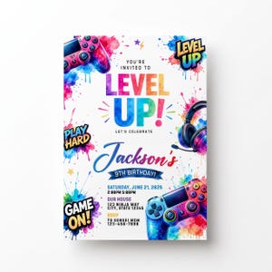 May include: A birthday invitation card featuring colorful watercolor splashes, two video game controllers, and gaming headphones. The text reads: You're invited to Level Up! Let's celebrate Jackson's 9th birthday! Saturday, June 21, 2025, 2:00pm-5:00pm, 123 Ninja Way, City, State 12345, RSVP to Sensei Mom 123-456-7890.