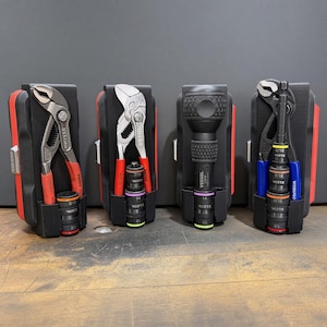 May include: Four black plastic tool organizers holding various hand tools. The set includes two pairs of Knipex pliers with red handles, a Vessel screwdriver, and a Workpro tool, each paired with stacked Klein socket adapters featuring colored rings.