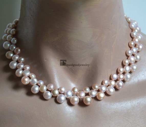 Sold at Auction: 14K Clasp Bronze Lavender Pearl Knotted Necklace