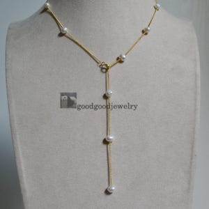 An Adjustable pearl necklace, pearl station floating necklace, Bridesmaid necklace, Illusion pearl necklace, candied necklace
