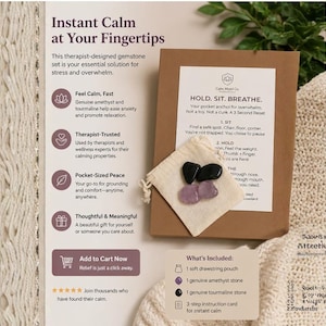 May include: A brown cardboard box containing a small beige drawstring pouch with one purple amethyst stone and one black tourmaline stone. The box features a white instruction card titled HOLD. SIT. BREATHE. and text about instant calm.