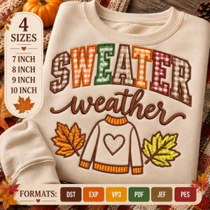 May include: A beige sweatshirt featuring an embroidered design with the text "SWEATER weather" in brown and plaid block letters. Below the text is an illustration of a sweater with a heart and two autumn leaves. Includes 4 sizes: 7, 8, 9, 10 inch.
