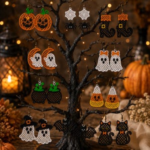 May include: A collection of Halloween-themed dangle earrings displayed on a black decorative tree. Designs include orange jack-o'-lanterns, white spiderwebs with spiders, black witch boots, ghosts on orange moons, white ghosts, green cauldrons, candy corn, ghosts in hats, black bats, and black cats.