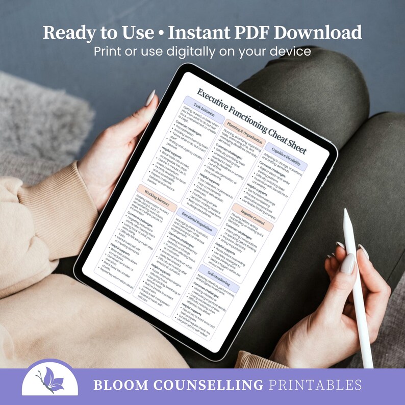May include: A digital tablet displaying an "Executive Functioning Cheat Sheet" with sections on task initiation, planning, and emotional regulation. The tablet is held by a person, and a stylus is visible. Text at the top reads "Ready to Use &bull; Instant PDF Download". The bottom text says "BLOOM COUNSELLING PRINTABLES".