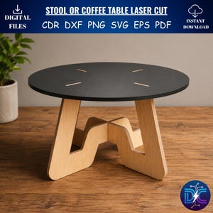 Könnte beinhalten: Ein schwarzer runder Couchtisch oder Hocker mit hellem Holzsockel. Der Tisch hat ein lasergeschnittenes Design und der Text "STOOL OR COFFEE TABLE LASER CUT" ist sichtbar. Der Tisch hat einen Durchmesser von ca. 46 cm.