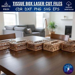 以下が含まれることがあります： 暗い木製のテーブルに、レーザーカットされた木製ティッシュボックスのデザインがいくつか表示されています。ボックスには複雑なパターンと切り抜きがあります。画像には「TISSUE BOX LASER CUT FILES」というテキストとファイルタイプのオプションが含まれています。