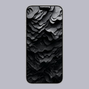 May include: A silver smartphone displays a dark, abstract wallpaper. The wallpaper features a layered, textured design in shades of gray and black, creating a sense of depth and dimension. The phone's screen is the focal point, showcasing the intricate pattern.