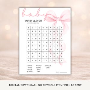 May include: A white baby shower word search game card featuring a large, soft pink watercolor bow on the right side and the word baby in pink script at the top. The grid contains various letters and a list of words to find, including diaper, pacifier, stroller, wipes, bottle, rattle, onesie, baby, blanket, and crib.