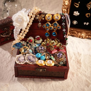 May include: A white ceramic mug with a black handle and the text "But First, Coffee" in a handwritten style. The mug is likely 11 ounces in size, perfect for a morning beverage.