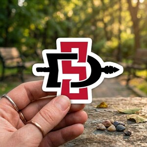 SD Monogram Spear Sticker, San Diego Red and Black Athletic Logo Decal, Sporty Letter S and D Vinyl Sticker for Laptop, Water Bottle