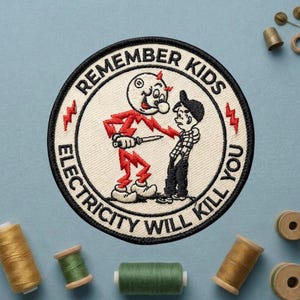 May include: A white ceramic mug with a black handle and the text "But First, Coffee" in a bold, black font. The mug is sitting on a wooden surface. The mug is approximately 4 inches tall.