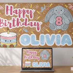 May include: A brown banner with the text "Happy Birthday Olivia" in pink and blue. The banner features a cartoon cake, a gray bunny holding the number 8, and confetti. A laptop displays the same design.